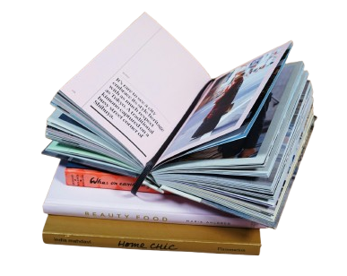 Open book displaying colorful pages and photographs.